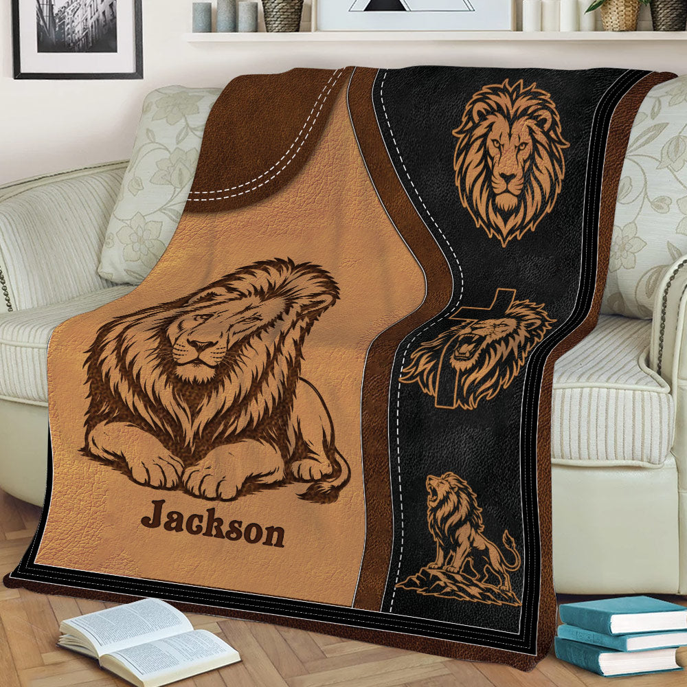 Close lifestyle view of a lion blanket on a sofa with detailed big cat artwork