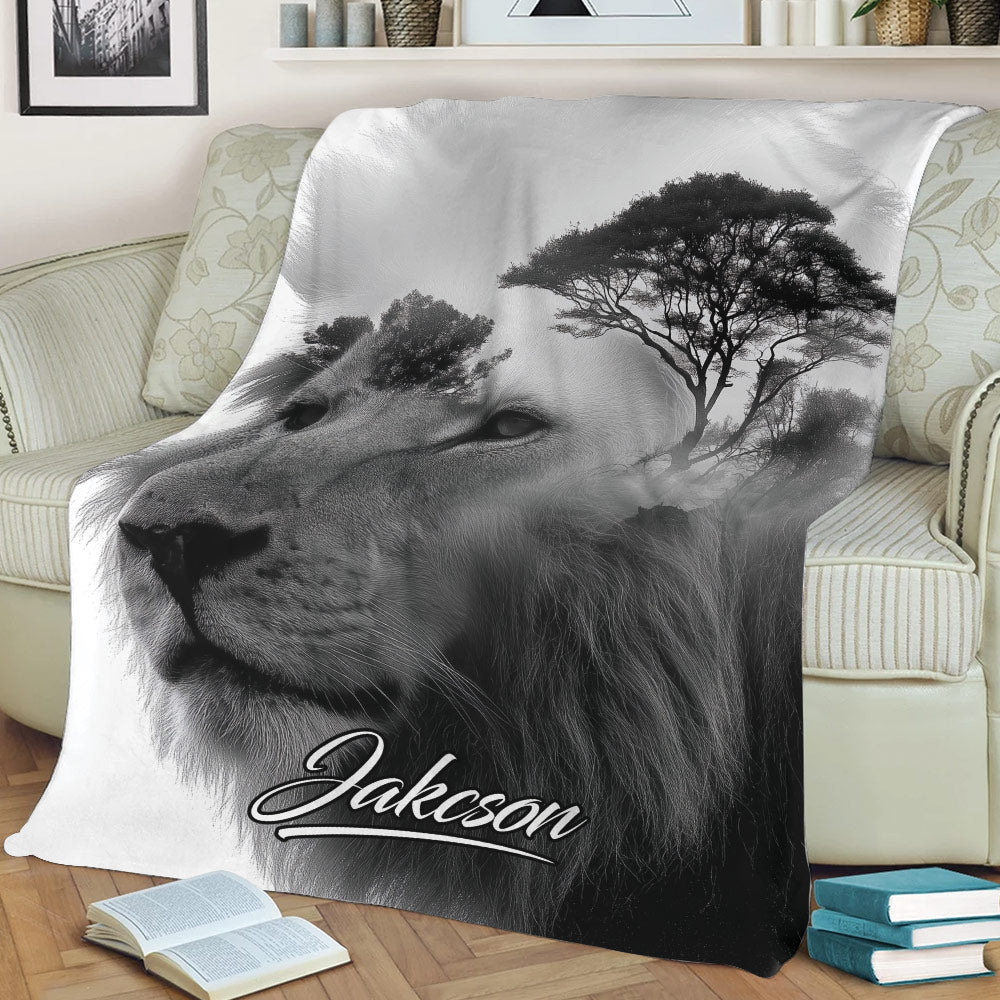 Close view of a monochrome lion blanket displayed across a living room sofa