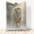 Lion throw blanket displayed upright with a majestic white lion in a snowy, glowing scene