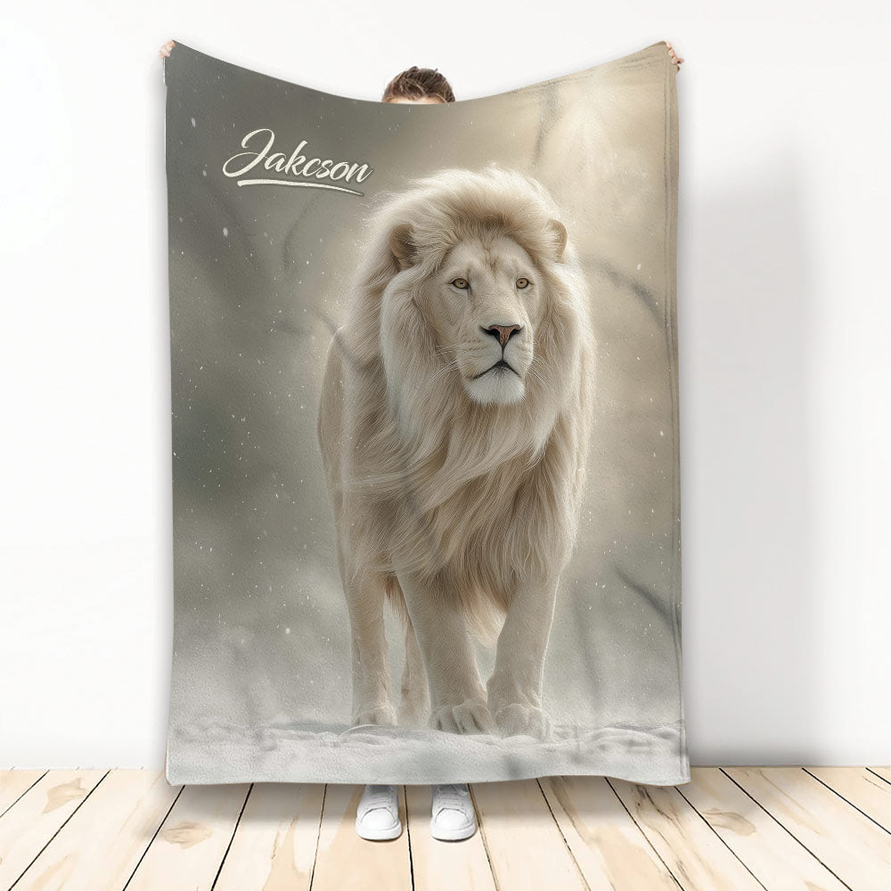 Lion throw blanket displayed upright with a majestic white lion in a snowy, glowing scene