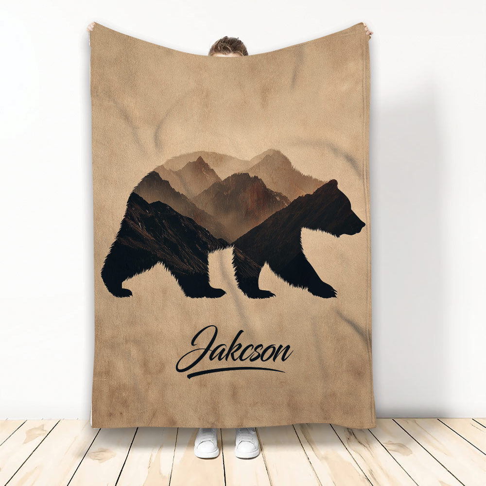 Bear throw blanket with three dark bear silhouettes, mountain scenery, and earthy brown wildlife artwork