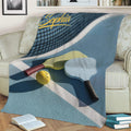 Close view of pickleball blanket artwork featuring paddles, ball, and net