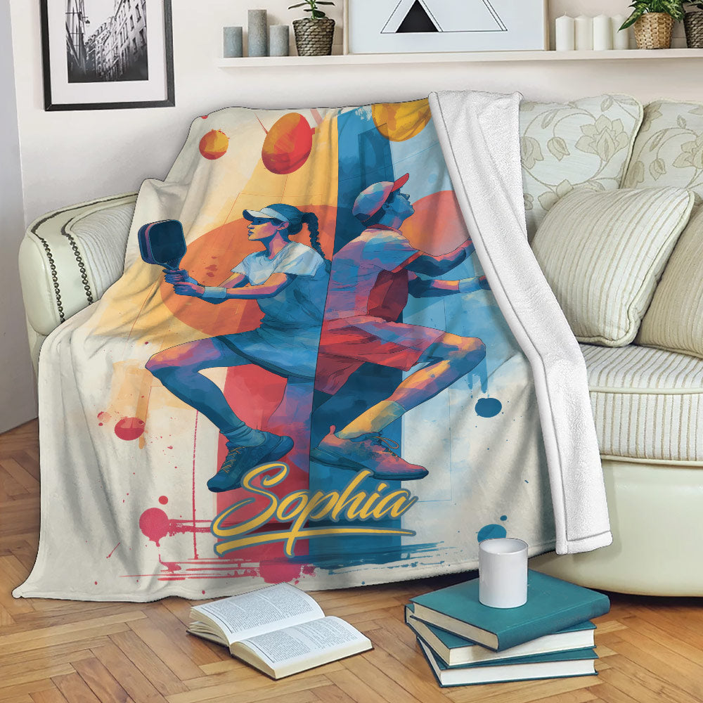 Colorful pickleball blanket draped over a living room sofa
