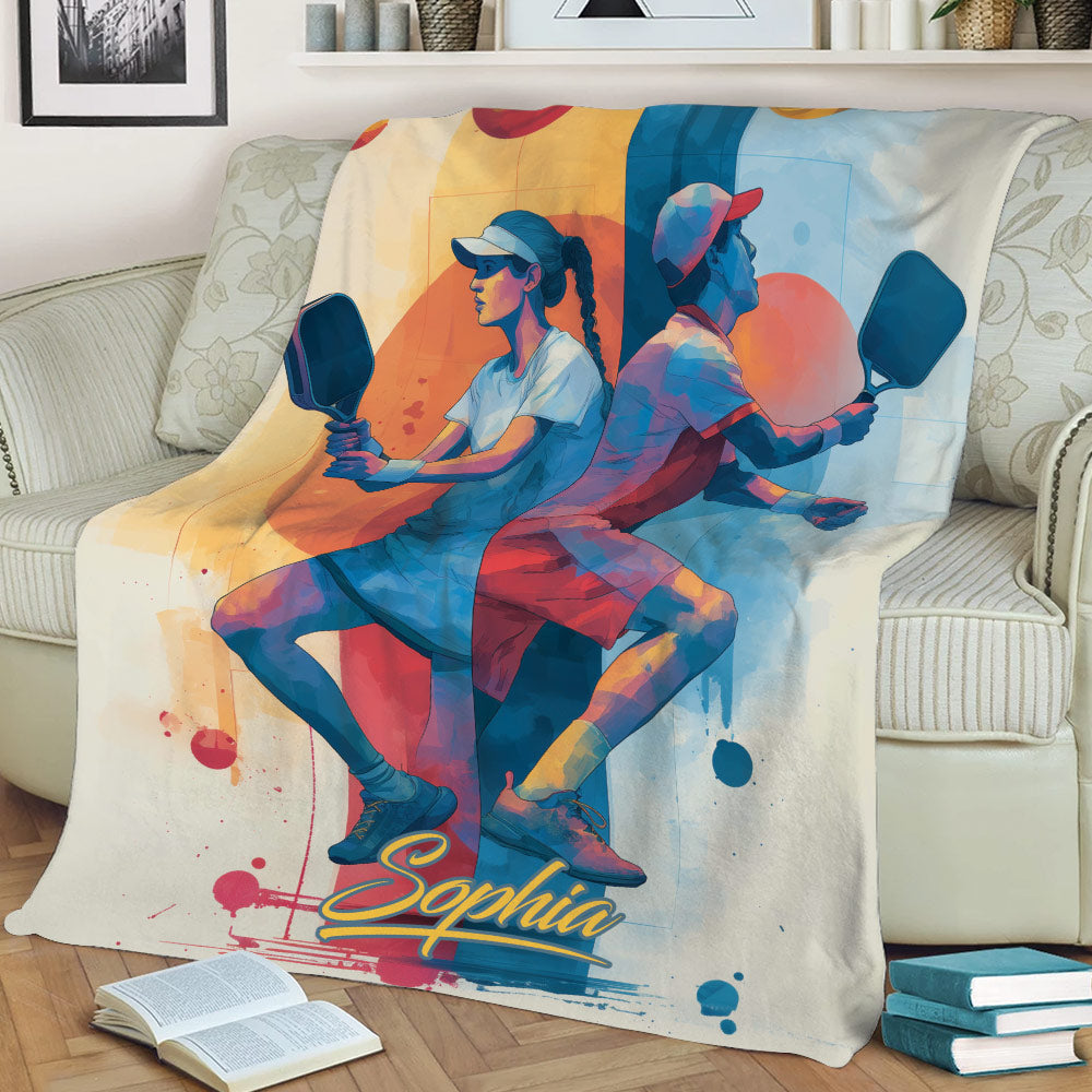 Pickleball player artwork displayed as a cozy couch throw blanket