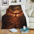 Fiery phoenix throw blanket displayed across a sofa in a cozy living room reading space