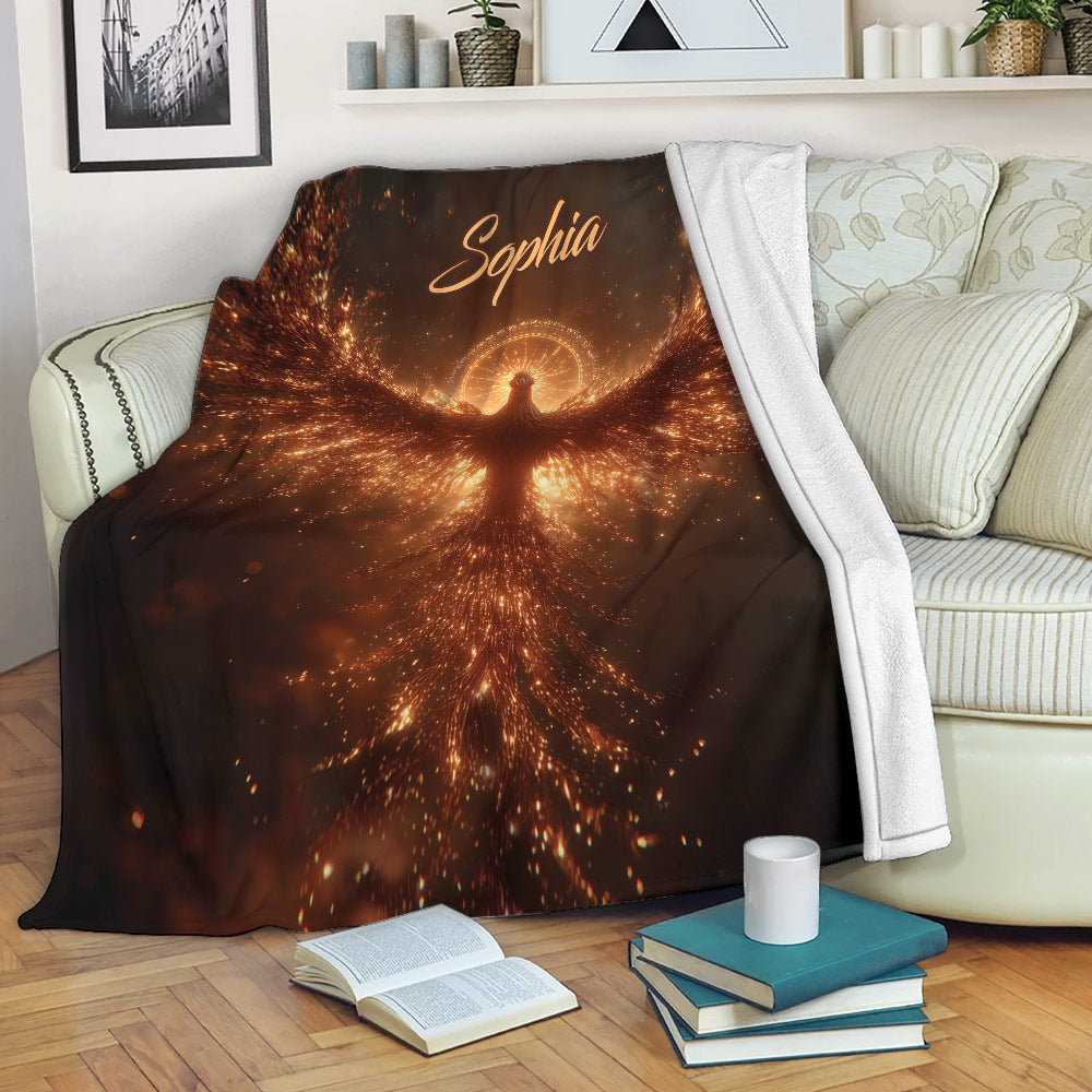 Fiery phoenix throw blanket displayed across a sofa in a cozy living room reading space