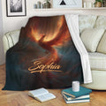 Fiery phoenix throw blanket draped across a sofa in a cozy reading space