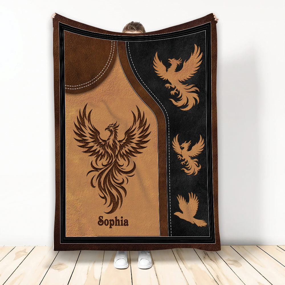 Phoenix throw blanket displayed upright with copper and black mythical bird artwork