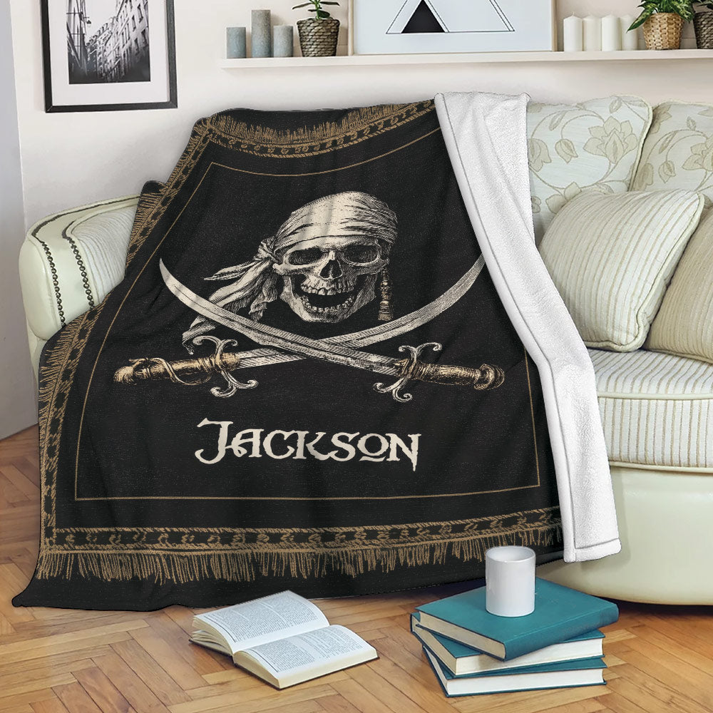 Pirate skull and crossed swords throw blanket styled on a living room sofa