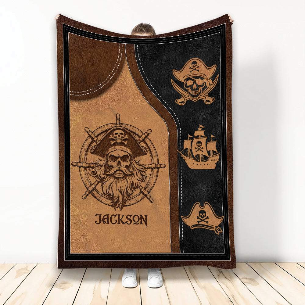 Pirate throw blanket featuring a skull captain at the ship wheel with hats, swords, and a sailing ship