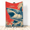 Shark throw blanket displayed upright with a vintage ocean wave illustration in red, cream, and navy