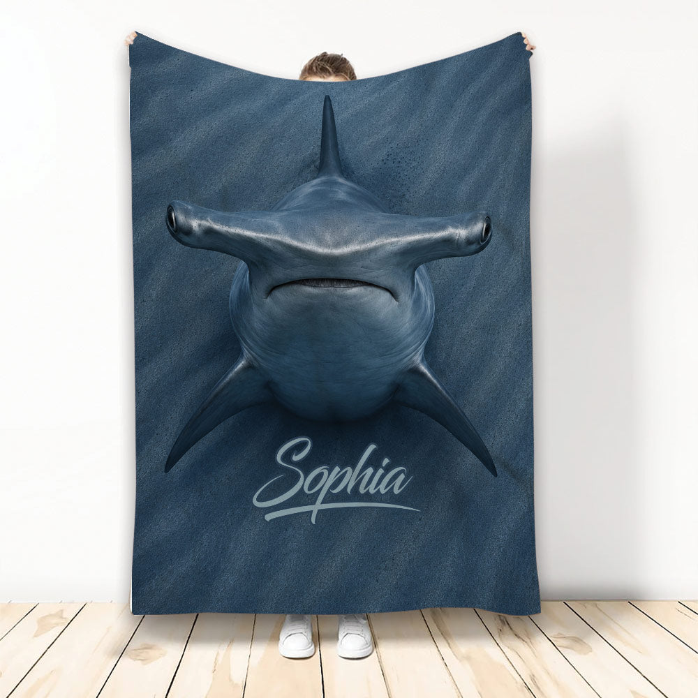 Hammerhead shark throw blanket displayed upright with deep blue ocean artwork