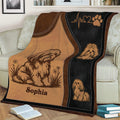 Close view of Lhasa Apso throw blanket artwork with illustrated dogs, flowers, paw print, and brown tones