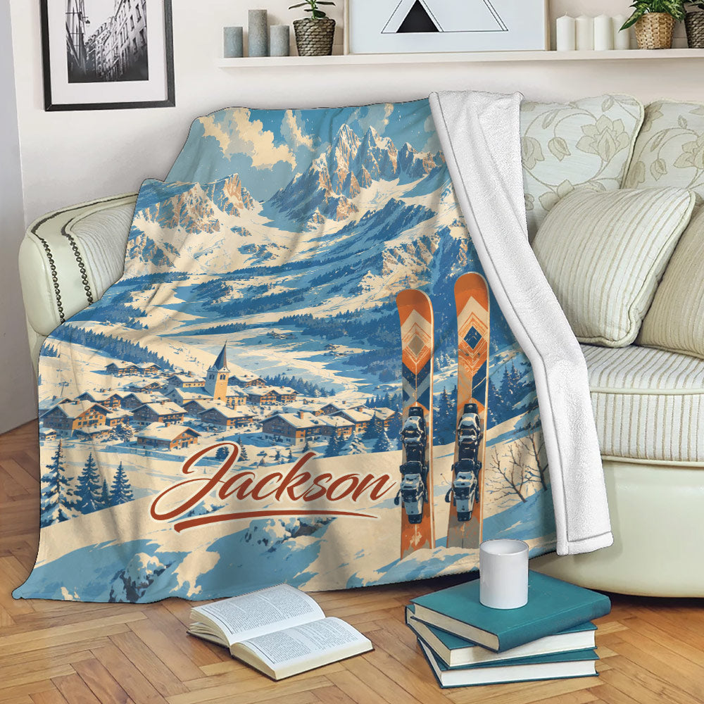 Skiing blanket draped over a sofa with snowy mountain resort artwork and skis