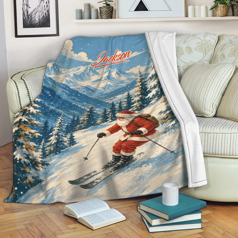Skiing throw blanket displayed on a sofa with Santa ski artwork and snowy mountain scenery