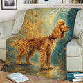 English Cocker Spaniel blanket draped over a sofa, featuring painterly golden dog and butterfly artwork