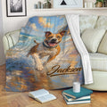 American Staffordshire throw blanket displayed on a sofa with vibrant beach and ocean dog artwork