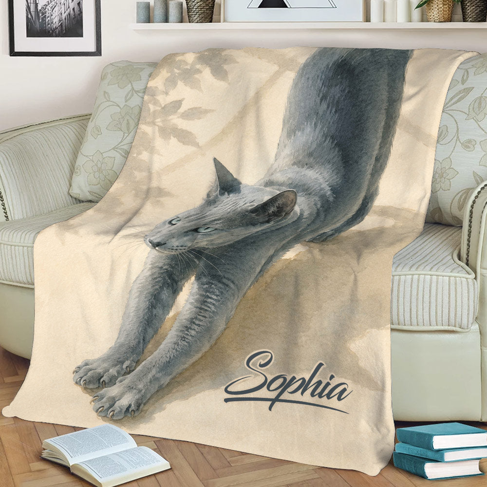 Watercolor Russian Blue cat blanket styled across a sofa with a calm neutral home decor setting