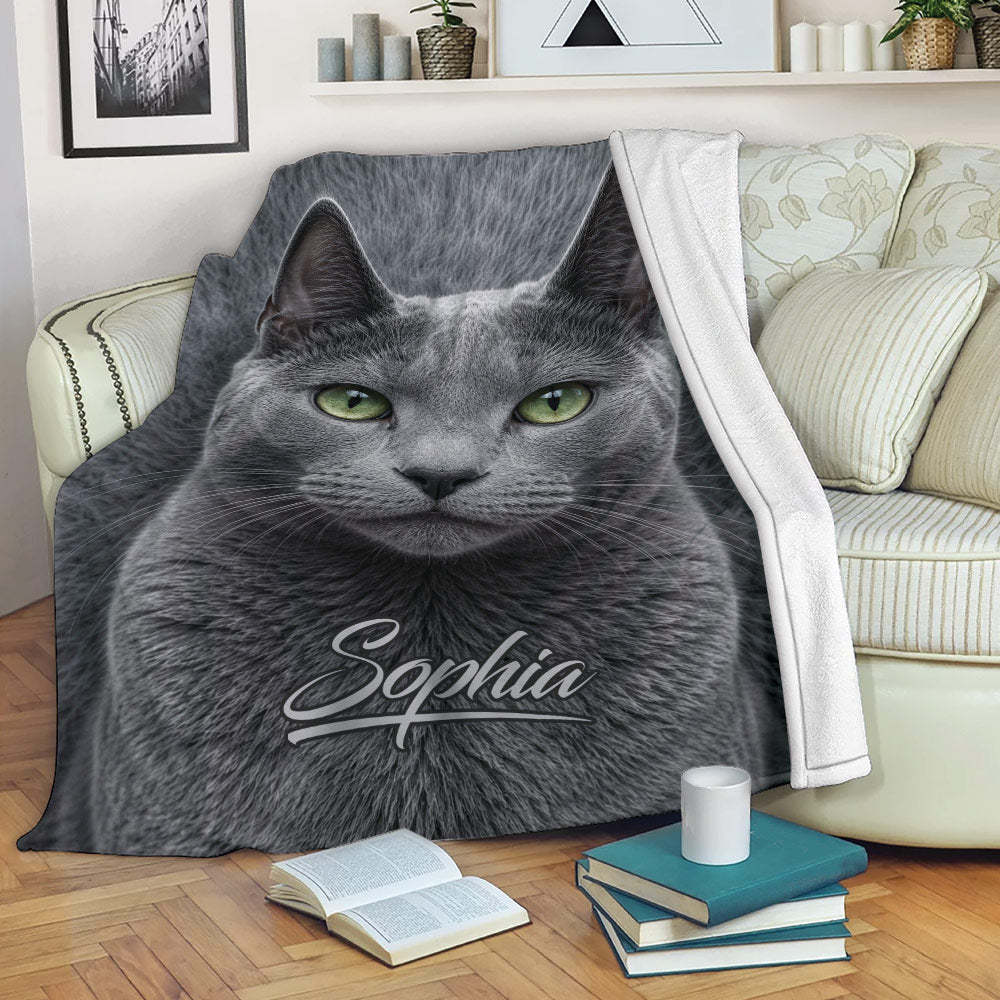 Russian Blue cat blanket draped over a sofa in a cozy living room setting