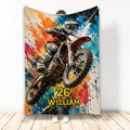 Motocross throw blanket featuring a dirt bike rider and vivid multicolor paint-splatter artwork