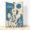 Dalmatian throw blanket with illustrated spotted dog artwork in blue and cream