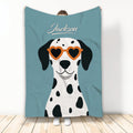 Dalmatian throw blanket featuring a spotted dog wearing orange heart-shaped sunglasses