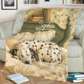 Close view of a Dalmatian dog throw blanket on a sofa with floral vintage decor