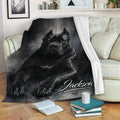 Black Cane Corso throw blanket displayed across a living room sofa