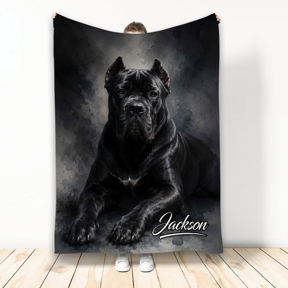 Black Cane Corso dog artwork on a dark watercolor throw blanket held up indoors