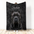 Cane Corso throw blanket featuring a powerful black dog portrait on a dark textured background