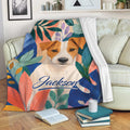 Colorful Jack Russell Terrier throw blanket draped over a sofa in a cozy living room