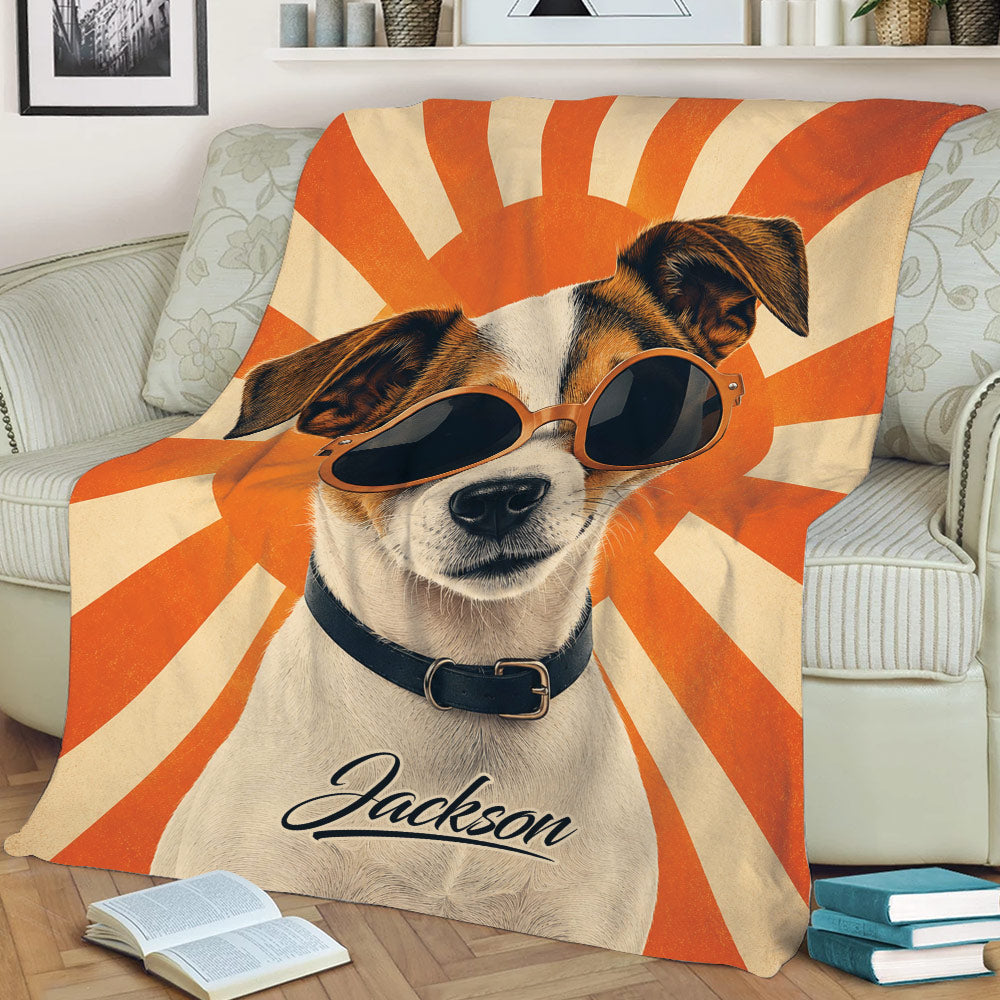 Retro Jack Russell throw blanket draped over a couch with sunglasses and warm orange artwork