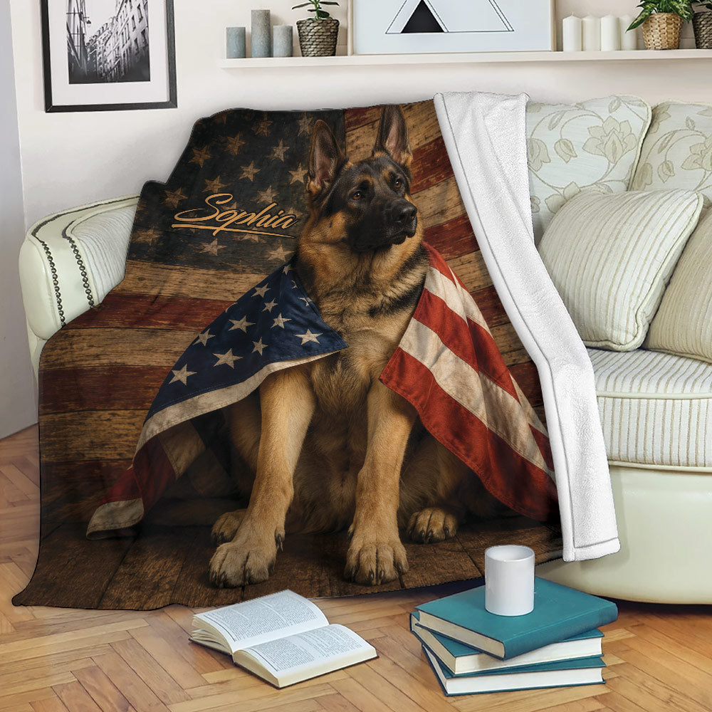 Patriotic German Shepherd throw blanket displayed on a sofa with books and cozy home decor