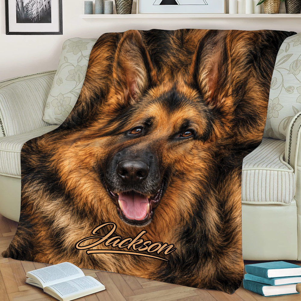 Close-up German Shepherd throw blanket styled across a sofa with realistic dog artwork