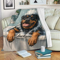 Rottweiler blanket draped over a sofa, featuring a playful bubbly dog design in a bathroom setting