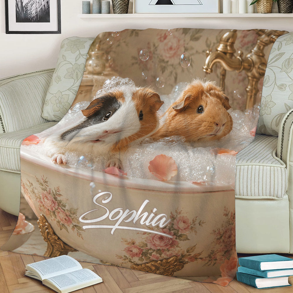 Cozy sofa styling with a guinea pig blanket showing two guinea pigs in a vintage tub