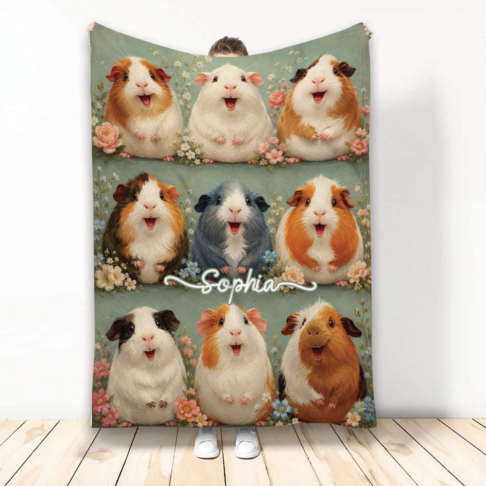 Guinea pig throw blanket with cheerful cavy artwork, flowers, and varied coat colors