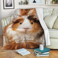 Guinea pig throw blanket draped across a sofa in a cozy living room