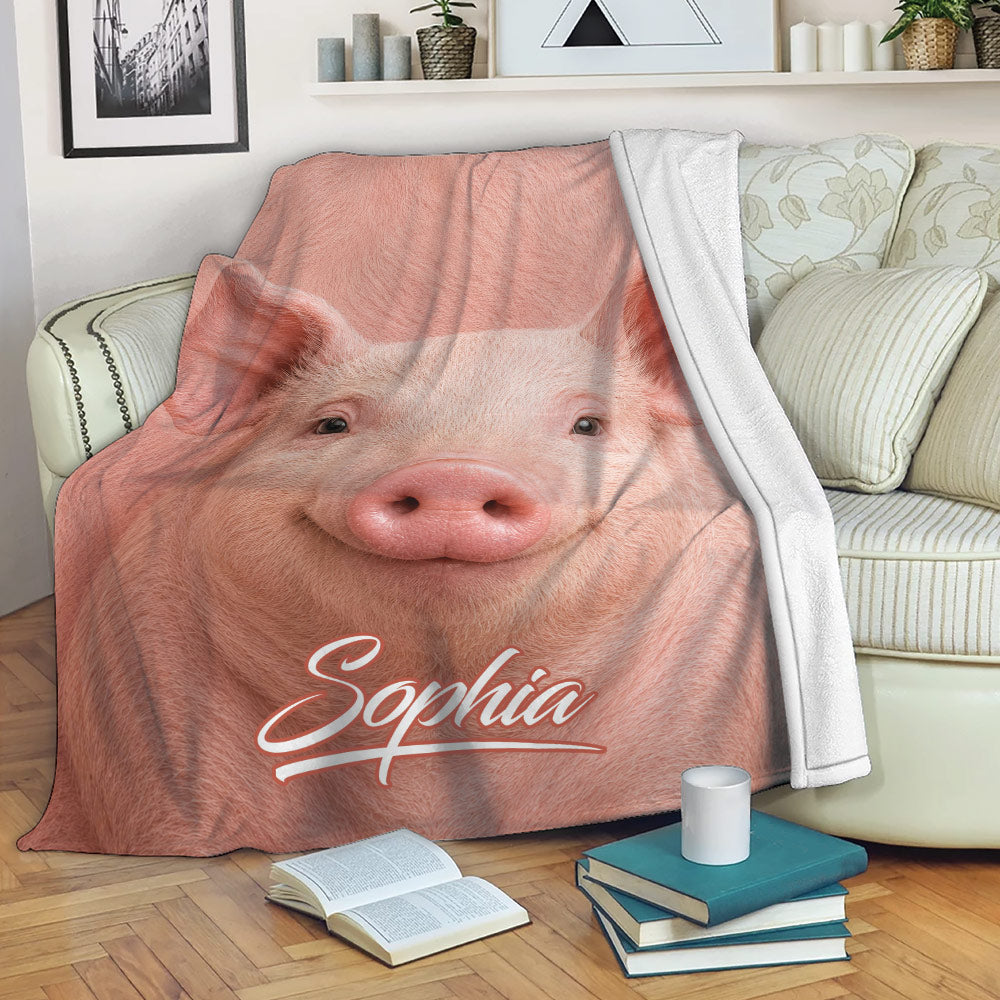 Realistic pink pig throw blanket draped across a living room sofa