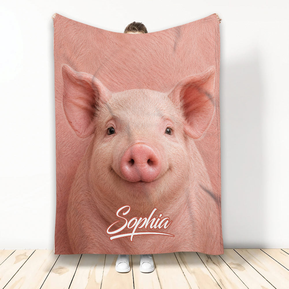Realistic pink pig throw blanket displayed upright with a close-up animal design