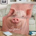 Close view of a realistic pink pig design on a sofa throw blanket