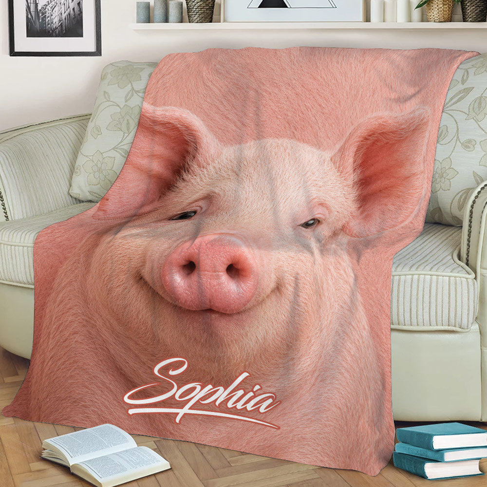Close view of a realistic pink pig design on a sofa throw blanket