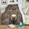 Realistic donkey throw blanket draped over a sofa in a cozy living room reading setting