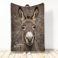 Realistic donkey face blanket displayed vertically in a bright room with a cozy animal design