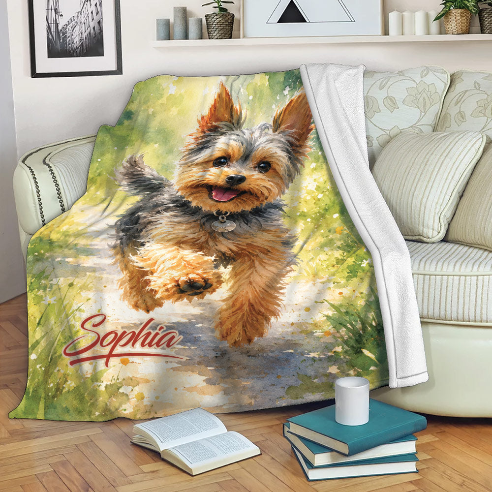 Yorkshire Terrier throw blanket displayed on a sofa with colorful outdoor watercolor artwork