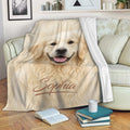 Golden Retriever blanket draped over a sofa in a cozy living room setting