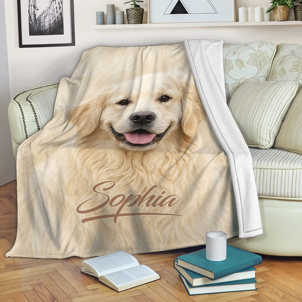 Golden Retriever blanket draped over a sofa in a cozy living room setting
