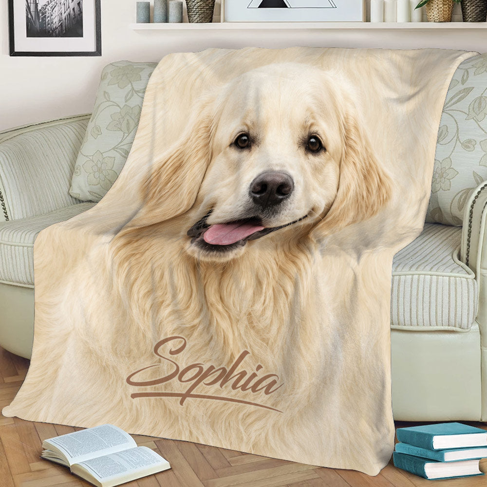 Golden Retriever throw blanket spread across a couch with a cheerful dog design