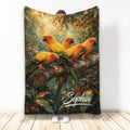 Custom conure throw blanket featuring colorful parrots perched on a branch in lush tropical foliage