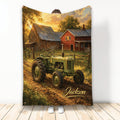 Rustic tractor blanket displayed upright with a vintage farm scene, red barn, golden fields, and autumn trees